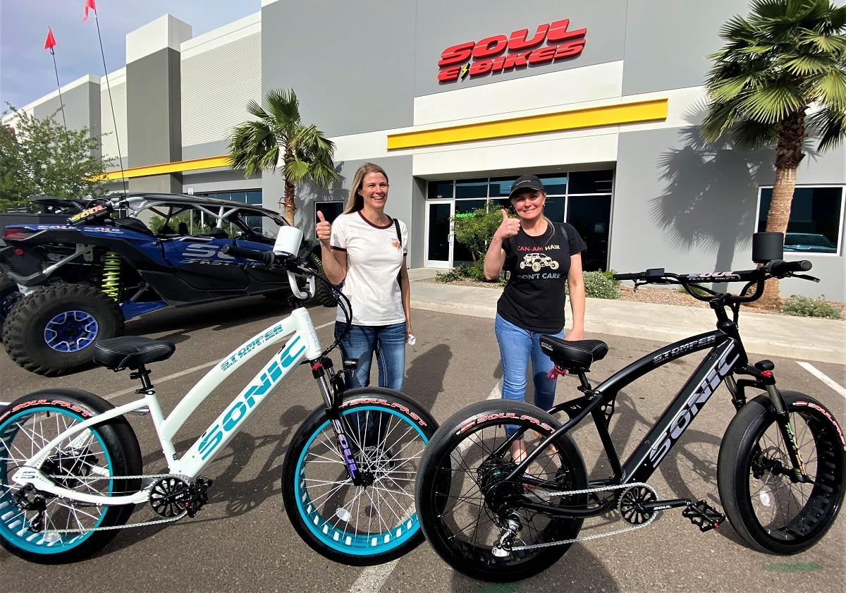 Two people approving their new bikes