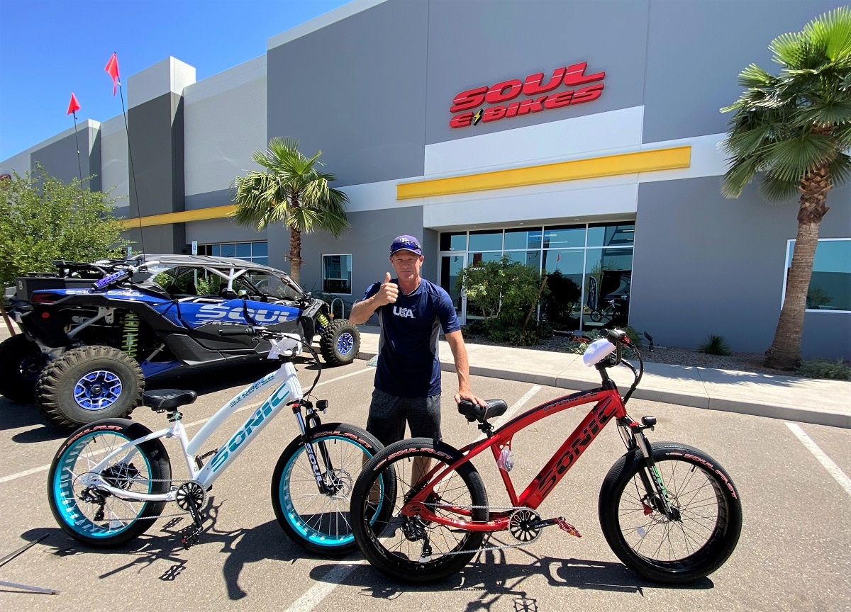 Two people with their new bikes